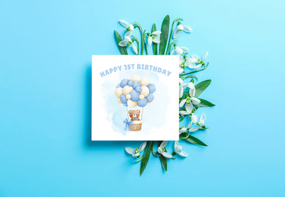 Teddy Bear in a Hot Balloon - 1st Birthday Card for Baby Boy – Cute Rabbit with a big Number 1 Design – Watercolour First Birthday Card for Son, Grandson, Nephew, Children's Birthday Card – Blue Envelope Included