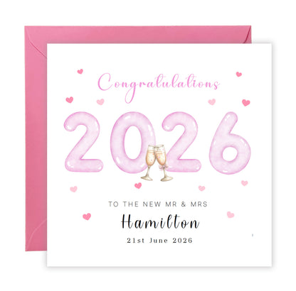 Personalised 2026 Wedding Card - Custom Couple's Surname & Wedding Date – Pink 2026 with Champagne Toast Design - Wedding Congratulations Card for Newlywed couples, Him or Her - Pink Envelope Included