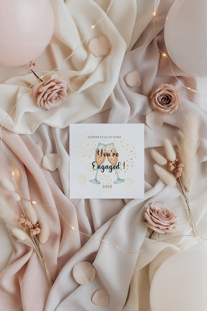 2026 Engagement Card - You’re Engaged Champagne Toast Design - Elegant Fireworks Congratulations Card for Newly Engaged Couple, Him or Her - Kraft Envelope Included