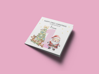 Personalised 1st Christmas Card for Baby Girl– Cute Santa and Xmas Tree Design with Customised Name and Message - First Xmas Card for Daughter, GrandDaughter, Niece - Pink Envelope Included