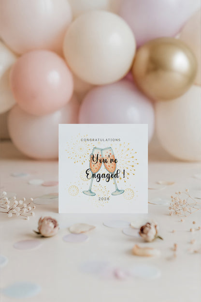 2026 Engagement Card - You’re Engaged Champagne Toast Design - Elegant Fireworks Congratulations Card for Newly Engaged Couple, Him or Her - Kraft Envelope Included