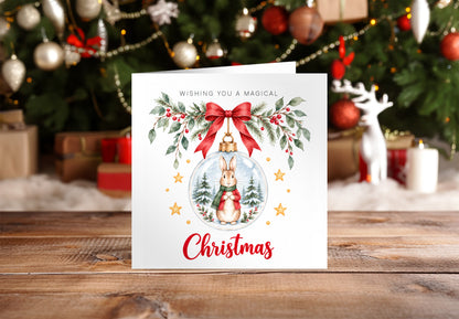 Festive Christmas card for Boys – Red Bunny in a Christmas Bauble