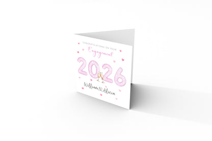 2026 Personalised Engagement Card with Custom Couple's Names – 2026 Champagne Toast Design - Congratulations Engagement Card for Newly Engaged Couples, Him or Her - Pink Envelope Included