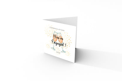 2026 Engagement Card - You’re Engaged Champagne Toast Design - Elegant Fireworks Congratulations Card for Newly Engaged Couple, Him or Her - Kraft Envelope Included