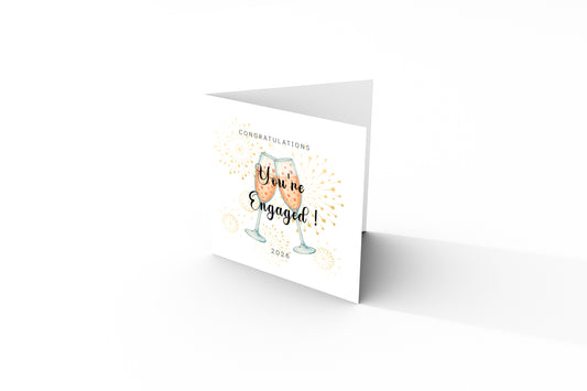 2026 Engagement Card - You’re Engaged Champagne Toast Design - Elegant Fireworks Congratulations Card for Newly Engaged Couple, Him or Her - Kraft Envelope Included