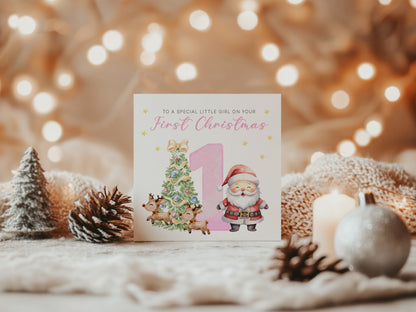 Happy 1st Christmas Card for Baby Girl– Cute Santa and Xmas Tree Design - First Xmas Card for Daughter, GrandDaughter, Niece - Pink Envelope Included