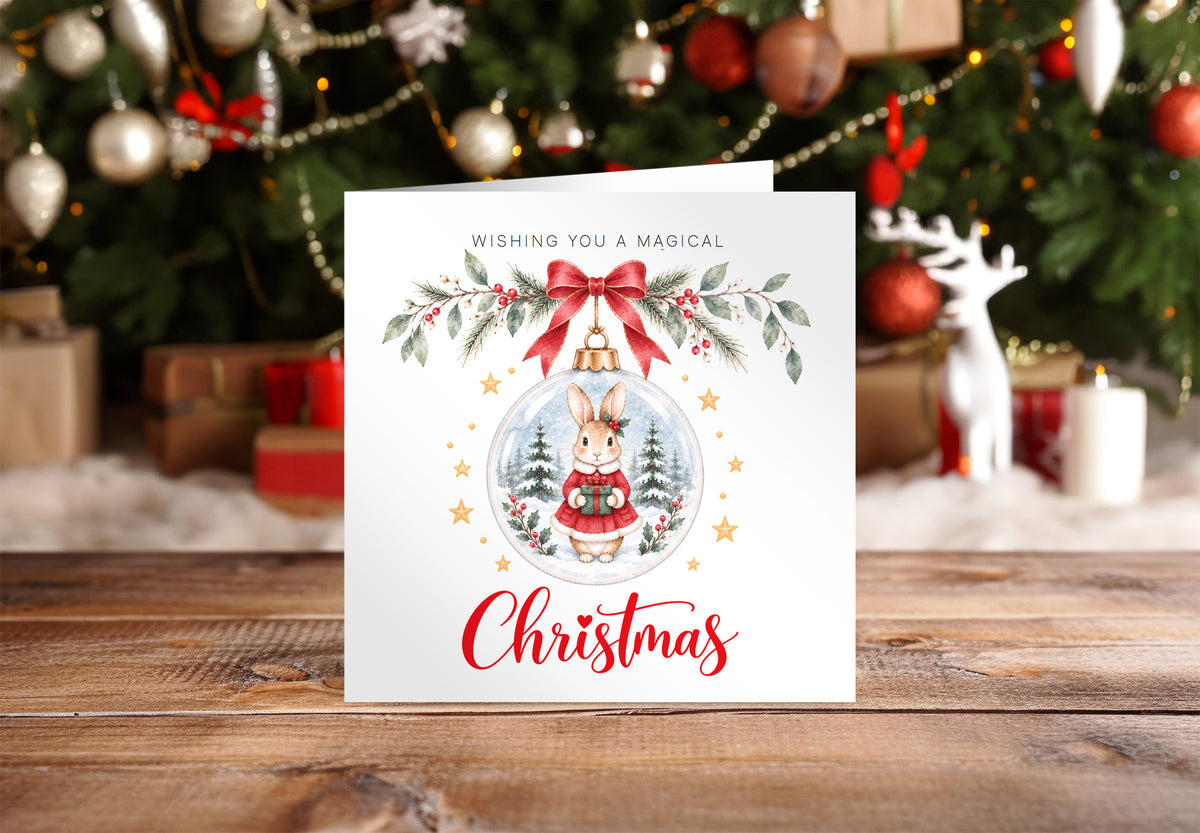 Festive Christmas card for Girls – Red Bunny in a Christmas Bauble