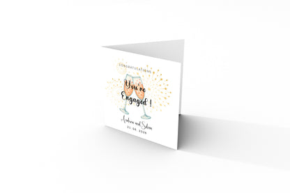 Personalised Engagement Card with Custom Couple's Name & Date – You’re Engaged Champagne Toast Design - Congratulations Card for Couples, Him or Her - Kraft Envelope Included