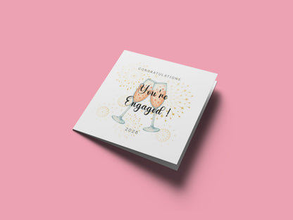 2026 Engagement Card - You’re Engaged Champagne Toast Design - Elegant Fireworks Congratulations Card for Newly Engaged Couple, Him or Her - Kraft Envelope Included