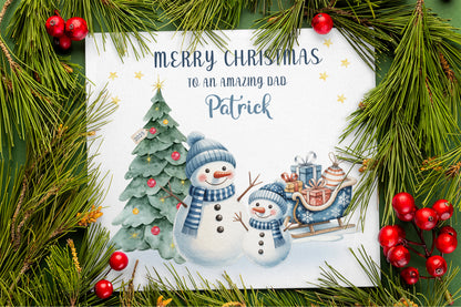 Personalised Christmas Card for Dad 2025 – Custom Name Xmas Card for an Amazing Dad – Cute Snowman & Tree Design – Festive Holiday Greeting Card with Blue Envelope – Gift from Son or Daughter