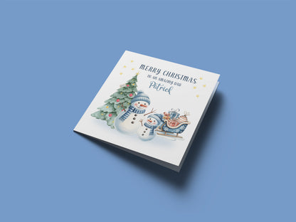 Personalised Christmas Card for Dad 2025 – Custom Name Xmas Card for an Amazing Dad – Cute Snowman & Tree Design – Festive Holiday Greeting Card with Blue Envelope – Gift from Son or Daughter